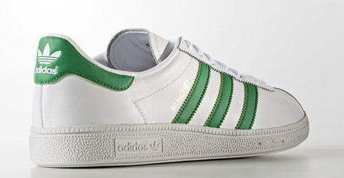 green and white adidas trainers